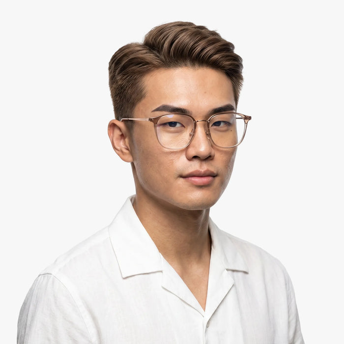 The Eydology Aubrie light brown gold frames boast a unisex square design, blending understated elegance for every wearer.