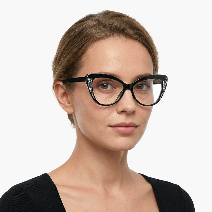 The Eydology Kairo series of black butterfly frames accentuate a woman's sleek confident charm.