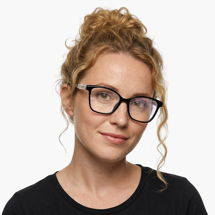 The eydology adriel series of black square frames accentuate a woman's wisdom and poise.