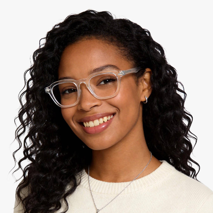 The Eydology Crystal series clear-colored square frames accentuate a woman's sunny confidence.
