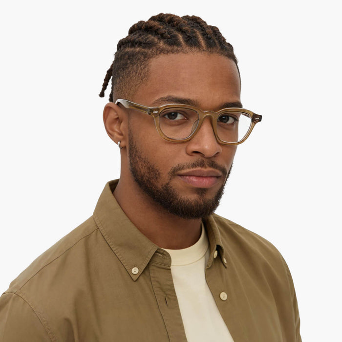 The Eydology Collin series in crystal kelp features versatile square frames that highlight effortless charm for both men and women.