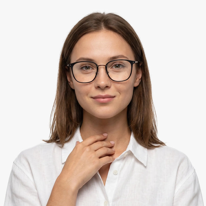 The Eydology Aubrie series of brown frames accentuate a woman's graceful unique charm.