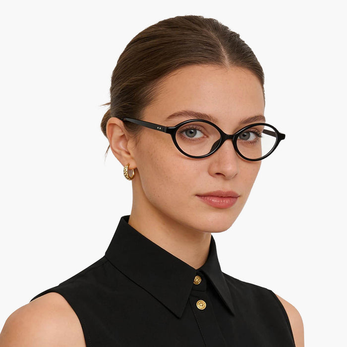 The Eydology Gage series of black frames accentuate a woman's intellectual charm.