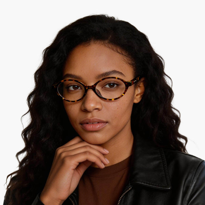 The Eydology Gage series of tortoise frames accentuate a woman's dignified elegance.