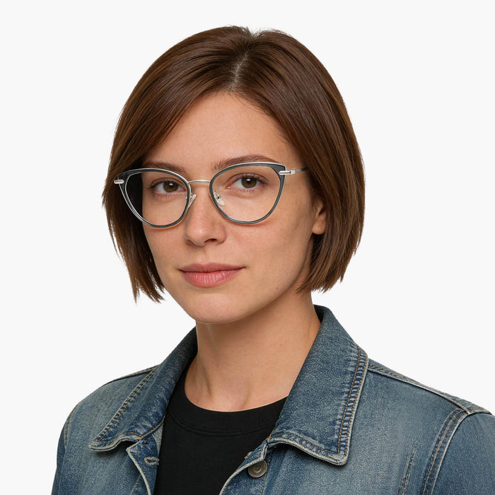 The Eydology Irene series of celadon green silver frames accentuate a woman's sleek capability.