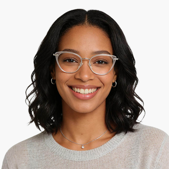 The Eydology Irene series of clear silver frames accentuate a woman's sunny vitality.