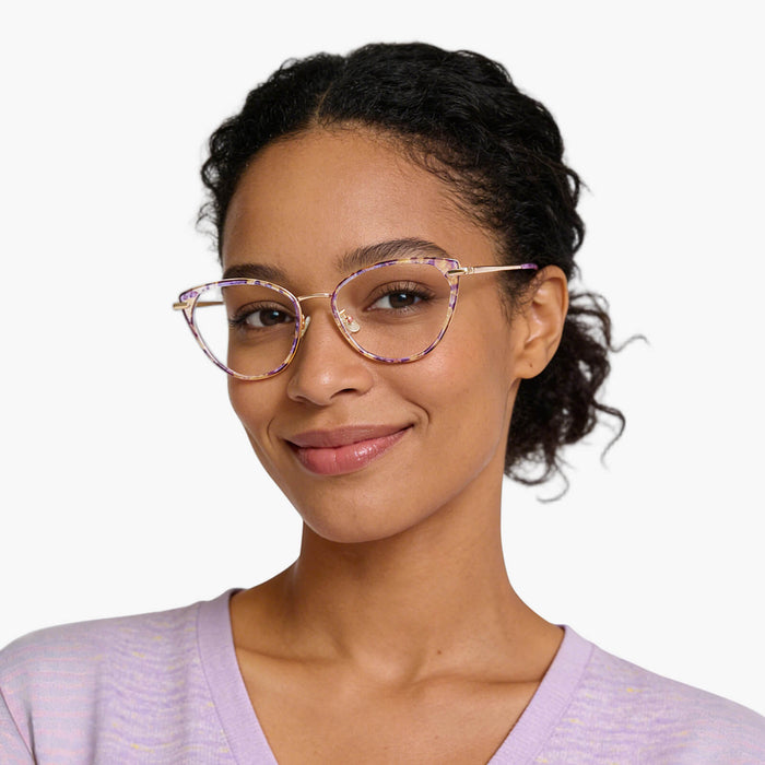 The Eydology Irene series of pink pearl rose gold frames accentuate a woman's stylish confidence.