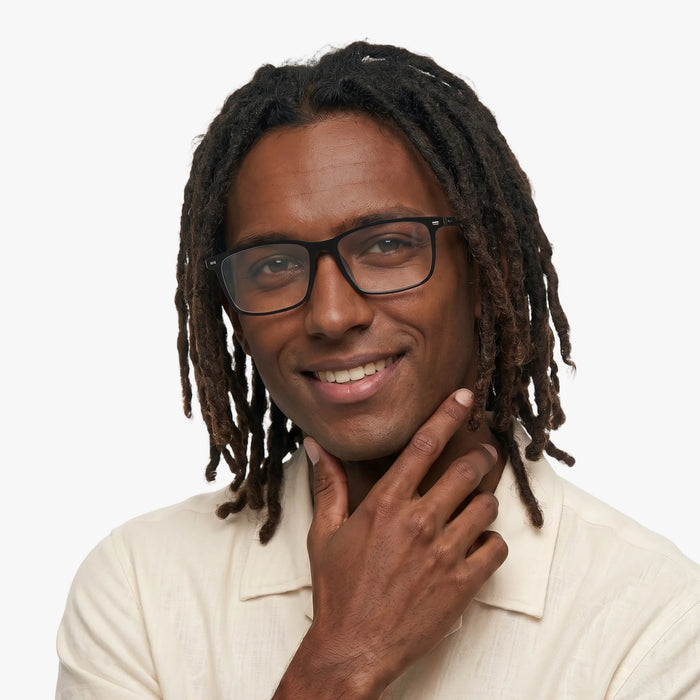 The Eydology Javier black frames boast a unisex rectangle design, blending understated elegance for every wearer.