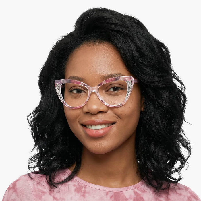 The Eydology Kairo series of pink tortoise butterfly frames accentuate a woman's graceful distinctive charm.