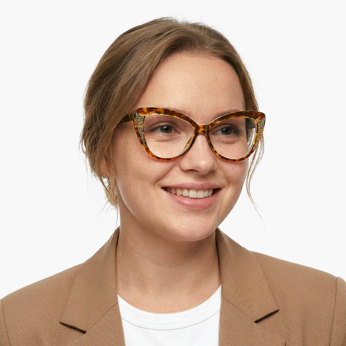 The Eydology Kairo series of tortoise butterfly frames accentuate elegant unique charm.