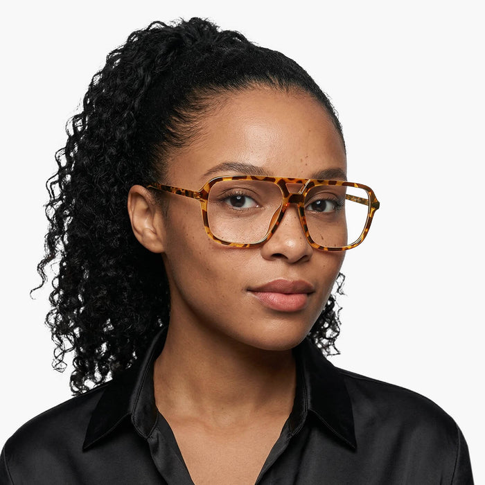 The Eydology Berkley series of tortoise aviator frames accentuate a woman's elegant refined charm.