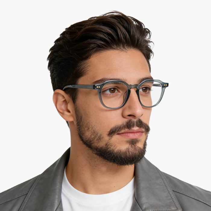 The Eydology Quentin series in transparent dark blue features versatile square frames that complement both men and women with effortless modern charm.